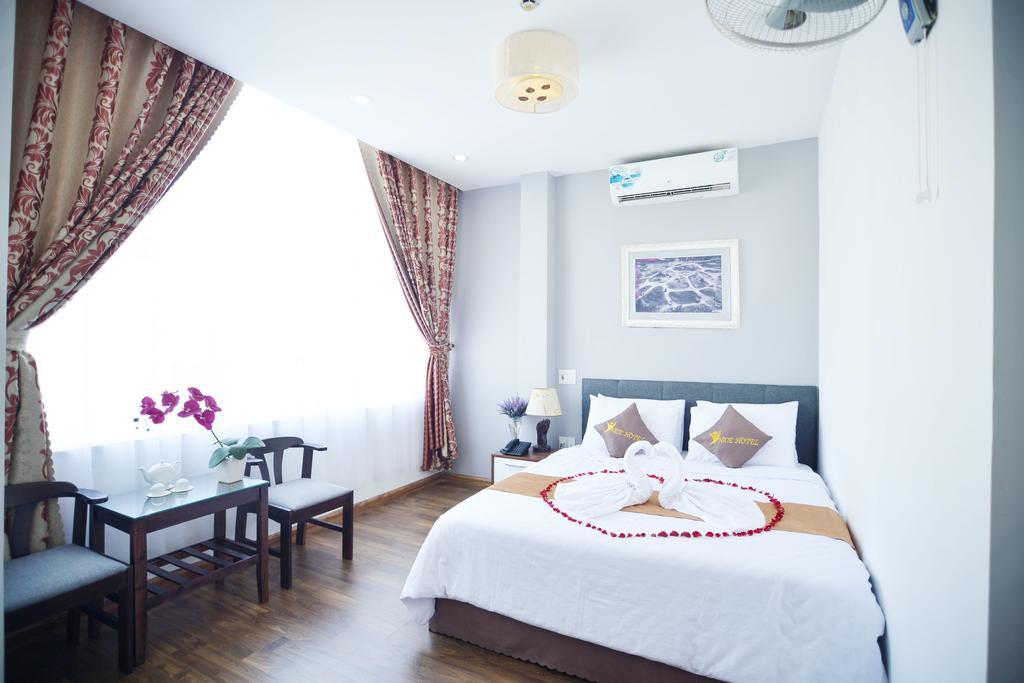 Nice De Paris Hotel Дананг Экстерьер фото